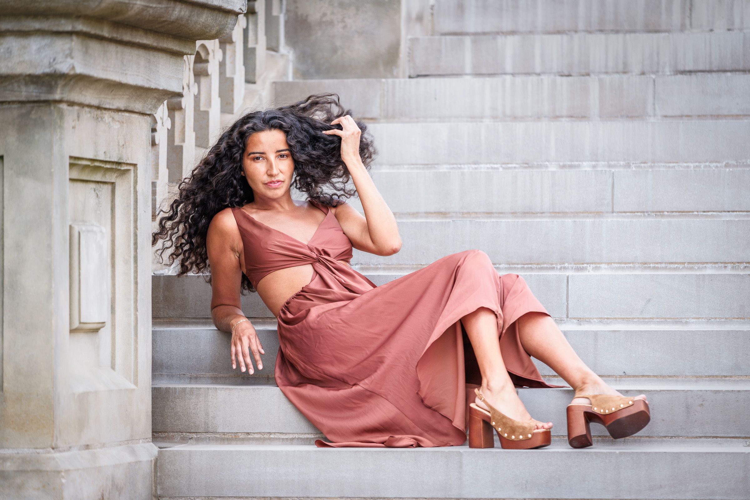 model wearing clay color dress