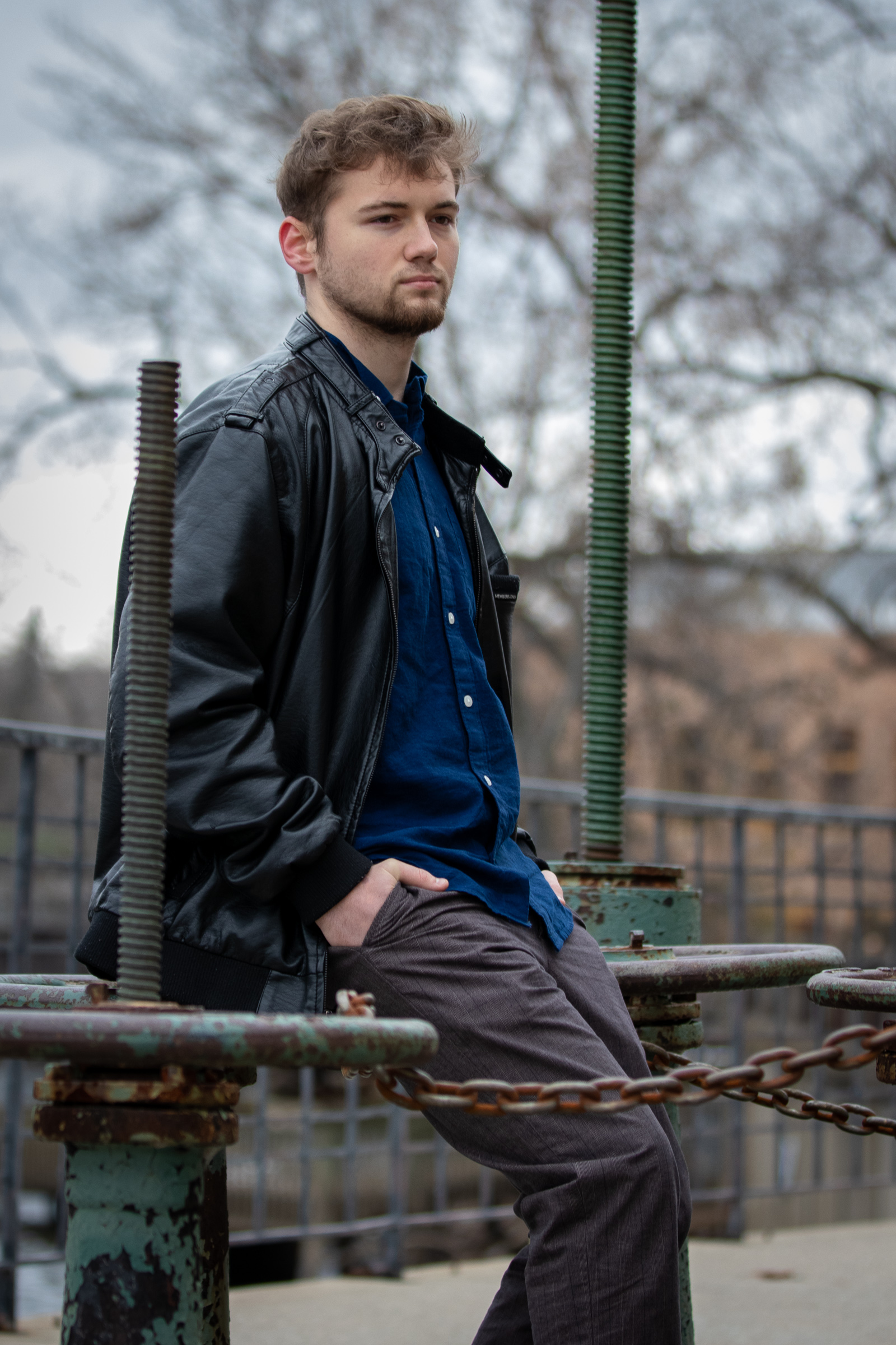 Senior guy in a leather jacket outdoors